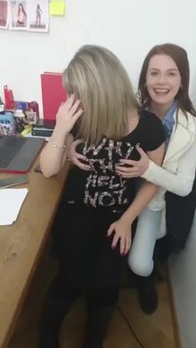 Giving a coworker a playful massage