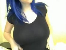 Busty blue-haired woman