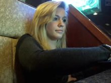 Sexy blonde flashes in the Internet Cafe